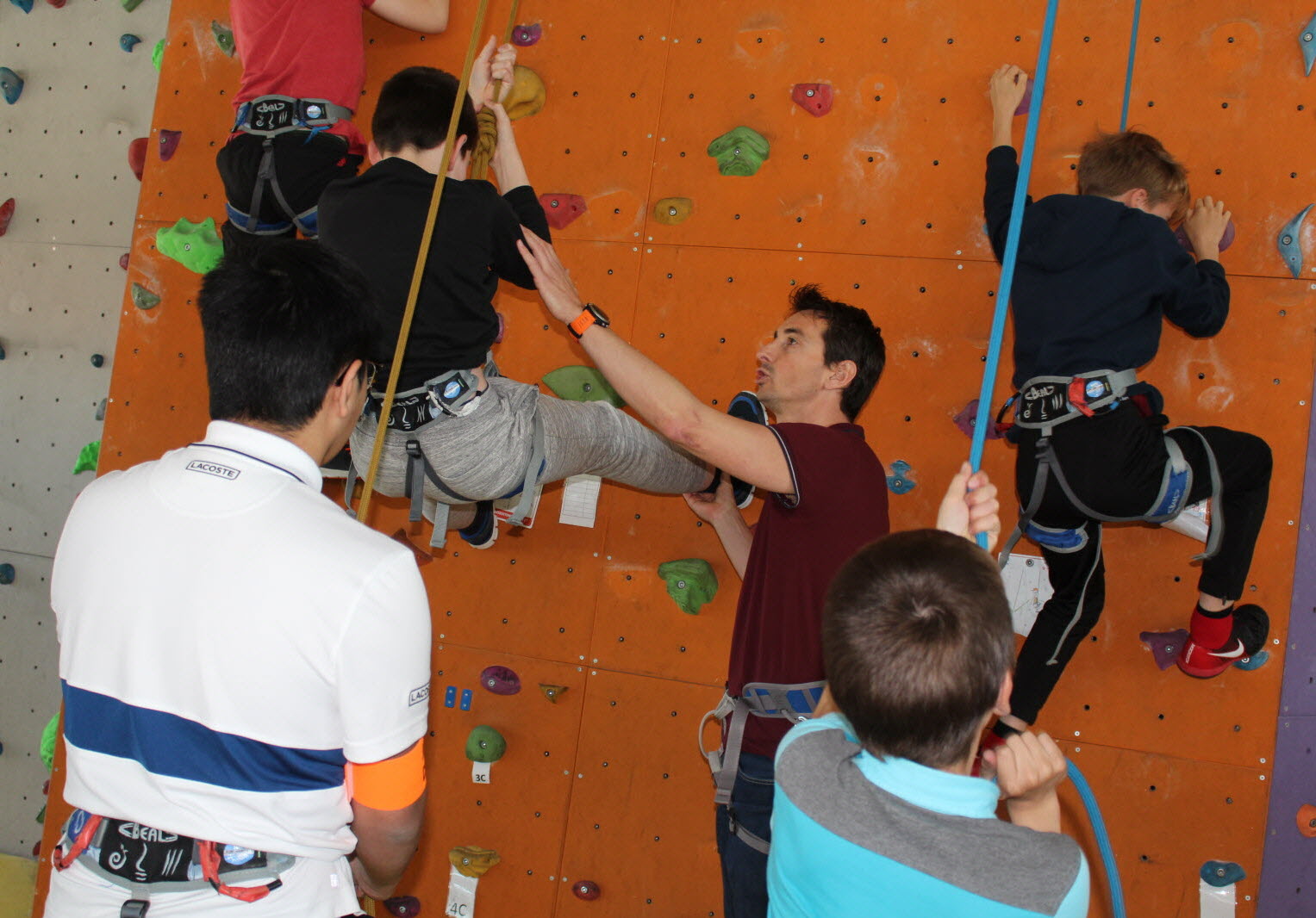A climber scaling a steep rock face.