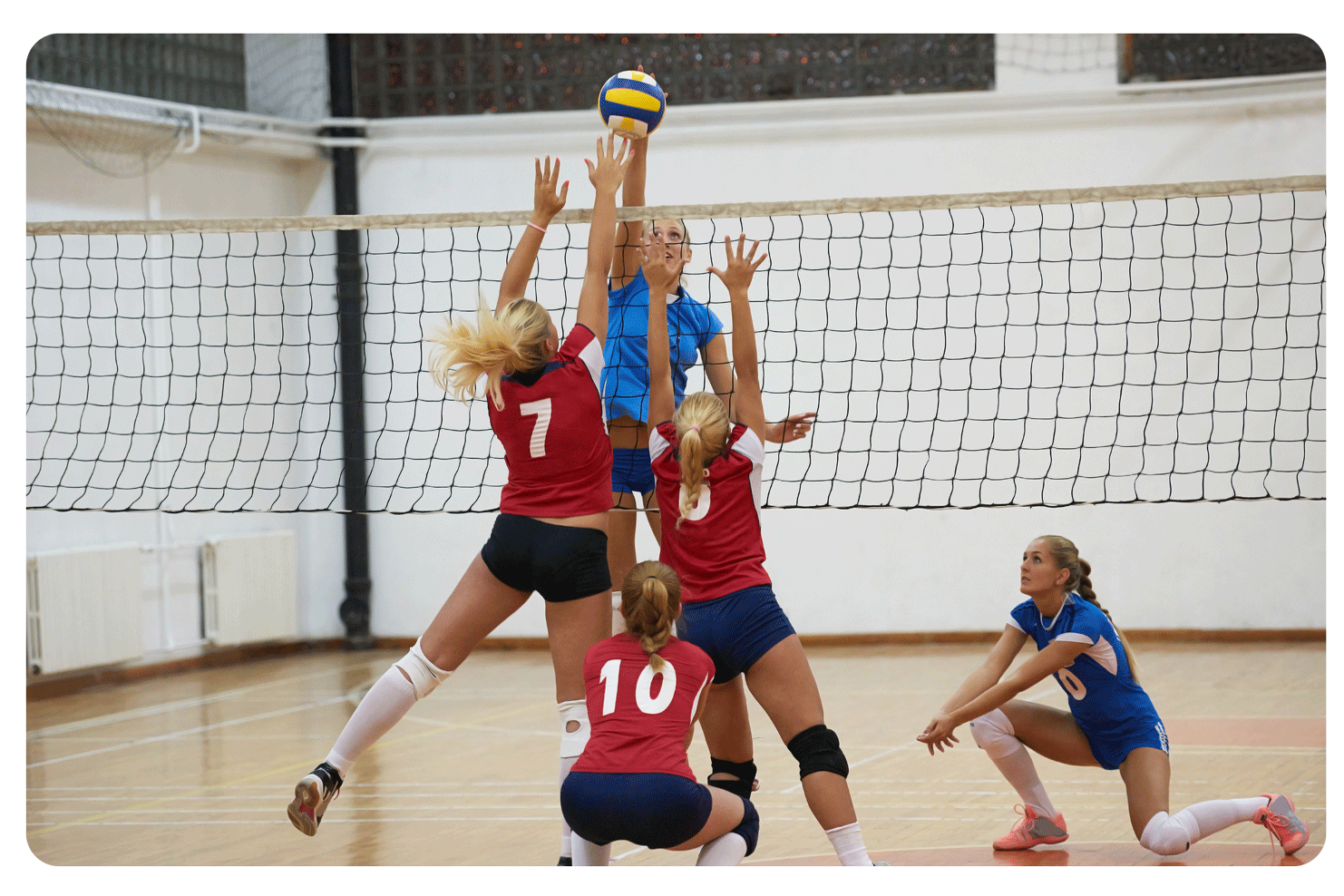 Volleyball player spiking the ball.